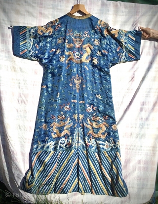 Imperial Chinese Robe: 19th century, nine dragons - one hidden inside flap. Condition is not great, staining upper front left and one or two loose threads here and there, especially golden threads  ...