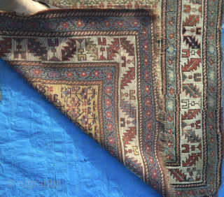 Attractive N W Persian runner, in ‘country house’ condition: overall uneven wear, sides and ends wearing in one or two places. Size:460cm x 115cm. Affordable        