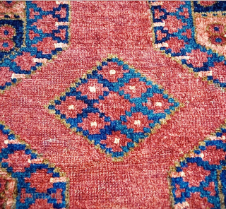 Late 19th-century Ersari Turkmen fragment, possibly a marriage or ‘hearth’ rug- has damage: one border has been reattached. Rich, soft, warm colours, wool feels very soft. Minor moth damage in places.
Size: 95cm  ...