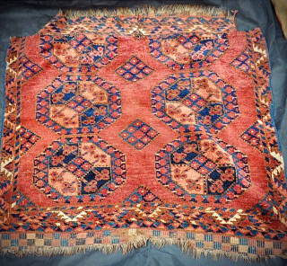 Late 19th-century Ersari Turkmen fragment, possibly a marriage or ‘hearth’ rug- has damage: one border has been reattached. Rich, soft, warm colours, wool feels very soft. Minor moth damage in places.
Size: 95cm  ...