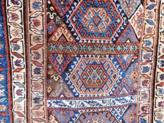 Kurdish rug. Wear to main ground with foundation showing in places. Sides need securing and tape has been added to reinforce them. Ends have been poorly secured. Great colours and a usable  ...