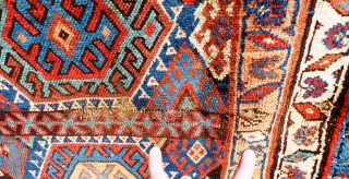 Kurdish rug. Wear to main ground with foundation showing in places. Sides need securing and tape has been added to reinforce them. Ends have been poorly secured. Great colours and a usable  ...