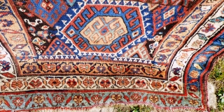 Kurdish rug. Wear to main ground with foundation showing in places. Sides need securing and tape has been added to reinforce them. Ends have been poorly secured. Great colours and a usable  ...