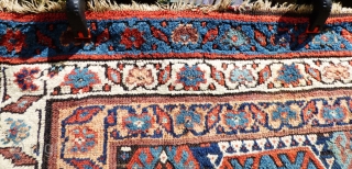 Kurdish rug. Wear to main ground with foundation showing in places. Sides need securing and tape has been added to reinforce them. Ends have been poorly secured. Great colours and a usable  ...