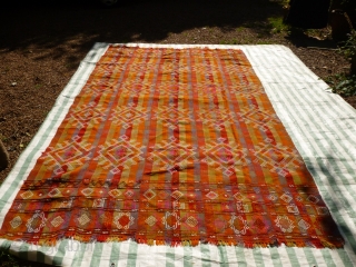 Dated Anatolian cover or Cicim. 

Size: 114 x 70 inches or 290 x 180 cm

Aged: dated 1944, see photo

Colours:  pinks, purples, ochres, reds, yellows, tangerine, olive green, white.

Condition: a couple of  ...