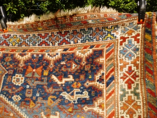 Colourful Khamseh 'chicken' carpet, 232 cm x 158 cm. Probably at least 100 years old with wonderful abrash in main field of different blues, nice greens in border. Two different yellows, one  ...