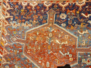 Colourful Khamseh 'chicken' carpet, 232 cm x 158 cm. Probably at least 100 years old with wonderful abrash in main field of different blues, nice greens in border. Two different yellows, one  ...