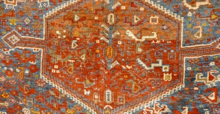 Colourful Khamseh 'chicken' carpet, 232 cm x 158 cm. Probably at least 100 years old with wonderful abrash in main field of different blues, nice greens in border. Two different yellows, one  ...