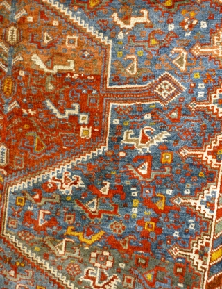 Colourful Khamseh 'chicken' carpet, 232 cm x 158 cm. Probably at least 100 years old with wonderful abrash in main field of different blues, nice greens in border. Two different yellows, one  ...