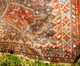 Colourful Khamseh 'chicken' carpet, 232 cm x 158 cm. Probably at least 100 years old with wonderful abrash in main field of different blues, nice greens in border. Two different yellows, one  ...