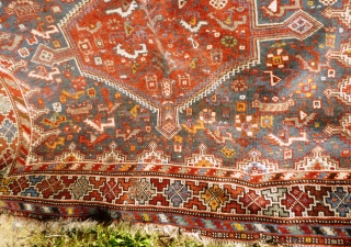 Colourful Khamseh 'chicken' carpet, 232 cm x 158 cm. Probably at least 100 years old with wonderful abrash in main field of different blues, nice greens in border. Two different yellows, one  ...