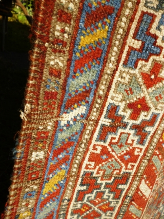 Colourful Khamseh 'chicken' carpet, 232 cm x 158 cm. Probably at least 100 years old with wonderful abrash in main field of different blues, nice greens in border. Two different yellows, one  ...