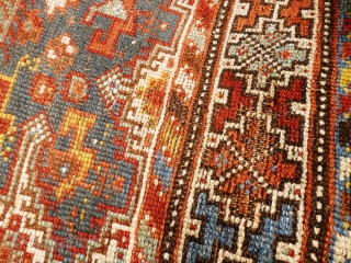 Colourful Khamseh 'chicken' carpet, 232 cm x 158 cm. Probably at least 100 years old with wonderful abrash in main field of different blues, nice greens in border. Two different yellows, one  ...