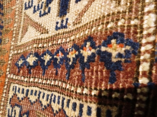 Archaic Afghan prayer ? rug. Possibly Baluchi and in a very worn state however could be hung. Displays Turkoman motifs. Has one kilim end with float weave details. Other end missing and  ...