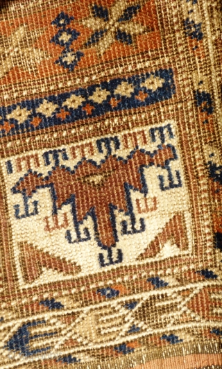 Archaic Afghan prayer ? rug. Possibly Baluchi and in a very worn state however could be hung. Displays Turkoman motifs. Has one kilim end with float weave details. Other end missing and  ...