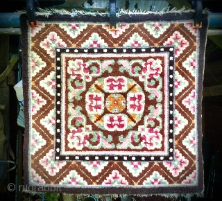 Tibetan seating mat, meditation square. Good even condition. Evidence of fuchsine. Size: 2ft x 2ft - 61cm x 61cm.              