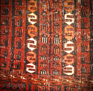 Worn old Saryk Turkmen ‘ensi’ door rug. Size: 155cm x 110cm. Pure wool, no cotton highlights or details. Many holes and sides and ends with losses and damage. Last image shows reverse  ...