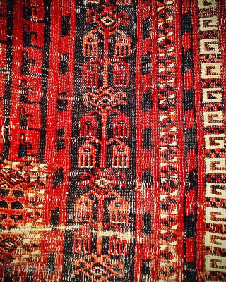 Worn old Saryk Turkmen ‘ensi’ door rug. Size: 155cm x 110cm. Pure wool, no cotton highlights or details. Many holes and sides and ends with losses and damage. Last image shows reverse  ...