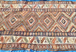 Luscious 19th century Tribal Persian long rug or carpet. Kurdish? Pure wool, vegetal colours. In so called ‘country house’ condition (meaning uneven wear, sides and ends tatty in places - see photos).  ...