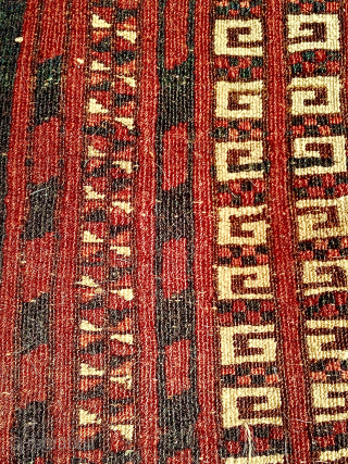 Worn old Saryk Turkmen ‘ensi’ door rug. Size: 155cm x 110cm. Pure wool, no cotton highlights or details. Many holes and sides and ends with losses and damage. Last image shows reverse  ...