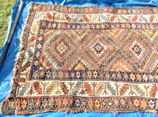 Luscious 19th century Tribal Persian long rug or carpet. Kurdish? Pure wool, vegetal colours. In so called ‘country house’ condition (meaning uneven wear, sides and ends tatty in places - see photos).  ...