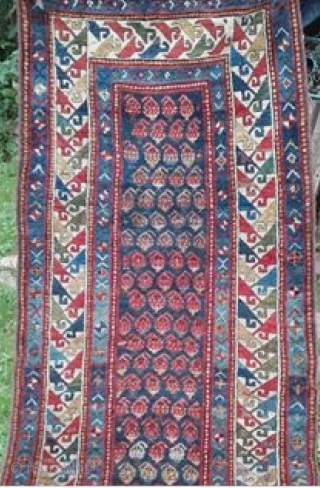 Caucasian Genje Boteh Long Rug, 19th Century. Original sides and ends, full pile, no restoration or repair. Great palette of vegetal colours, eveidence of fuchsine. Size: 8ft 1in x 3ft 7in 246cm  ...