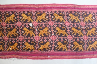 India Cloth Patola with tiger motive found from Indonesia. 19th century. Size : 225cm x 60cm. condition : left and right part of the cloth has been cut and re sewingg. And  ...