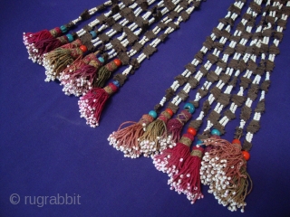 Pair of multi strand Tassels. Northern Afghanistan. 
Cloves, glass beads, silk and cotton. 
Length 50 cm.
Not 100% sure of origin or use. 
I was told they hung where food was prepared to  ...