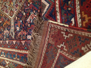 rug no	:	28
size	:	276 x 202
type	:	Antique 1900
origin	:	Iran
design	:	Khamseh Morghi
content	:	Wool on wool



this main carpet is original morghi(chicken) in very good even low pile-no knots showing. it has pretty original kilim and fringes- it can be used  ...