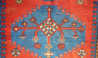 Antique Kazak rug. Circa 1900.175cm x 114cm.All good dyes.Small hole to fiels and some wear.                  