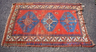 Antique Kazak rug. Circa 1900.175cm x 114cm.All good dyes.Small hole to fiels and some wear.                  