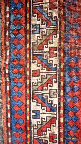 Antique Kazak rug. Circa 1900.175cm x 114cm.All good dyes.Small hole to fiels and some wear.                  