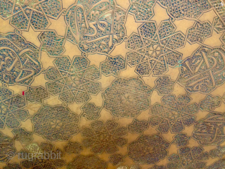 This original antique Persian/Middle Eastern Octagonal 19th c. brass tray features exquisite hand engravings with eight Arabic calligraphy cartouches.
The intricate design and the beauty of the engravings make it a unique piece  ...