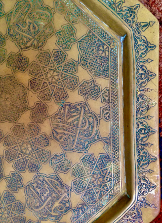 This original antique Persian/Middle Eastern Octagonal 19th c. brass tray features exquisite hand engravings with eight Arabic calligraphy cartouches.
The intricate design and the beauty of the engravings make it a unique piece  ...