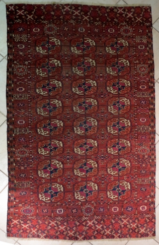 Gorgeous Turkman Tekke. Low pile on all the field, some little old repairs but the carpet is intact and in good condition. Age is 100 years old. Size is cm 190x115. very  ...