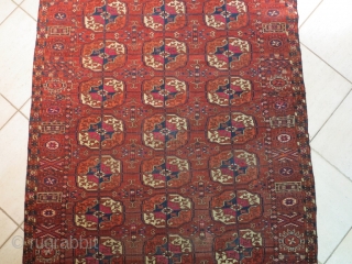 Gorgeous Turkman Tekke. Low pile on all the field, some little old repairs but the carpet is intact and in good condition. Age is 100 years old. Size is cm 190x115. very  ...