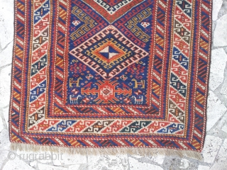KAZAK cm 200x125  6,5"X4" ca. 1920 ca.

very good condition, in pile. Nice motifs on the bottom head with little animals and a different motif under the three  medallions, probably a  ...