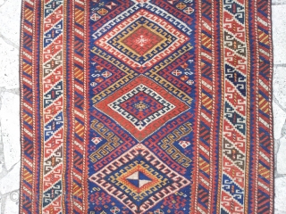 KAZAK cm 200x125  6,5"X4" ca. 1920 ca.

very good condition, in pile. Nice motifs on the bottom head with little animals and a different motif under the three  medallions, probably a  ...
