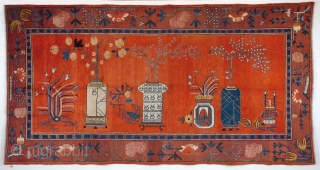 Khotan cm 406x210. some old repairs but really lovely piece, beautiful combination of colors and amazing border. Age 1900 ca.             