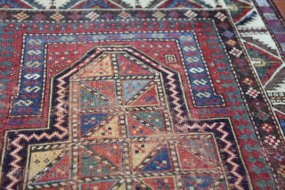 Unusual Kazak cm 149x98
Ends restored, and in low pile here and there, especially on dark brown details.
Quite rare composition of the ground with polychrome triangles generating other shapes such as squares and  ...