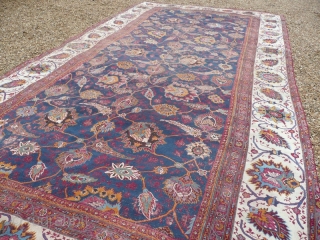 Late 19th century Indian large carpet.

Beautiful Indian Amritsar type carpet. This lovely old piece has lived a life; there are various old patches and repairs, also it has been reduced in size  ...