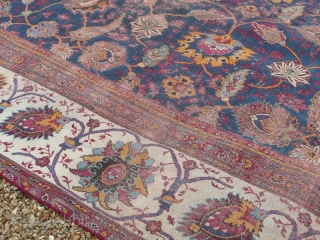 Late 19th century Indian large carpet.

Beautiful Indian Amritsar type carpet. This lovely old piece has lived a life; there are various old patches and repairs, also it has been reduced in size  ...