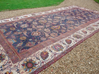 Late 19th century Indian large carpet.

Beautiful Indian Amritsar type carpet. This lovely old piece has lived a life; there are various old patches and repairs, also it has been reduced in size  ...