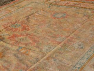 Lovely soft wool and colours, on this faded old west Anatolian Ghordes/Ushak type carpet. Condition, areas of wear but has been cleaned and ends stopped so ready to use. Size: 15'.4" x  ...