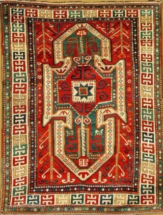 Best wishes and a prosperous 2020 for all Rugrabbits. ! 
Soutwest Caucasus, Three large stepped medallions along the central axis ,spacious conceived on the warm red field.
Good range of colours, wool on  ...