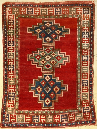 Best wishes and a prosperous 2020 for all Rugrabbits. ! 
Soutwest Caucasus, Three large stepped medallions along the central axis ,spacious conceived on the warm red field.
Good range of colours, wool on  ...