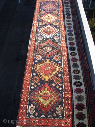 Borchali, 19th.C.  With exuberant colors, all natural. Condition B\C .Wool on wool .And a raw White. Ca. 310 x 110 cm. Some old repairs in the field.,cleaned and washed. A main  ...