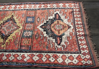 And in this corner, a big all natural coloured meaty piled, first halved 20th.C. Kurd from Quchan, measuring a staggering 155 x 285 cm. a little dusty, all wool, no losses..  