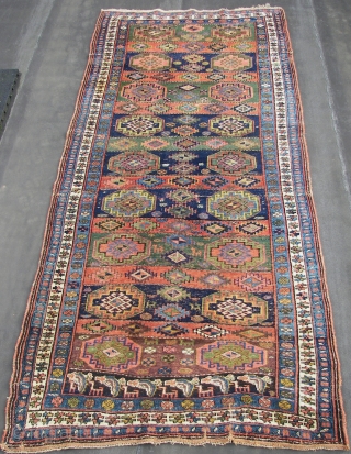 A  Kurdish  village ( not county ) , all woolen  and  all natural coloured , with long necked  beasts  infested rug.( ca 310 x 135 cm.  ...