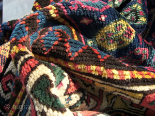 An Armenian Gendje ( also ; Ganja,Genje,Ghyandzha,Elisavetpol.) Kazak, in good allover condition. Antique. Ca. 240 x 135 cm. Long haired. ( And a great Purple.) Eagle beacked main border, and a characteristically  ...